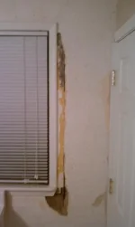 Repairing plastered exterior wall around a window