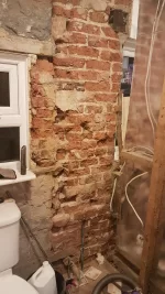 Advise on repairing old wall before tanking