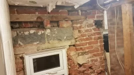 Advise on repairing old wall before tanking