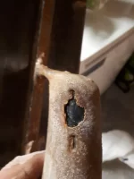 Wood or rubber handle