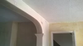 Small arch with fluted pilasters