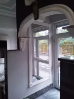 Small arch with fluted pilasters