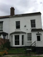 Are any modern renders suitable for a solid brick home?