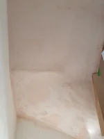 Plastered winders under stairs not drying properly