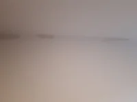 New ceiling and cracks forming along edge of wall