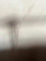 My plasterer skimmed OVER wallpaper - HELP