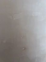 My plasterer skimmed OVER wallpaper - HELP