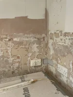 Plastering after tile removal