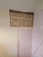 Render or plasterboard on solid wall