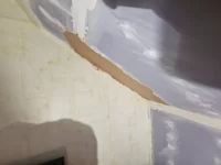 Plastering over fresh plaster