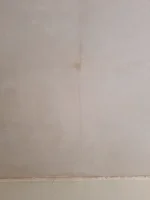 Newly skimmed Artex ceilings all showing long cracks (see pictures) - seeking advice on expectations/workmanship