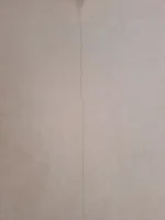 Newly skimmed Artex ceilings all showing long cracks (see pictures) - seeking advice on expectations/workmanship
